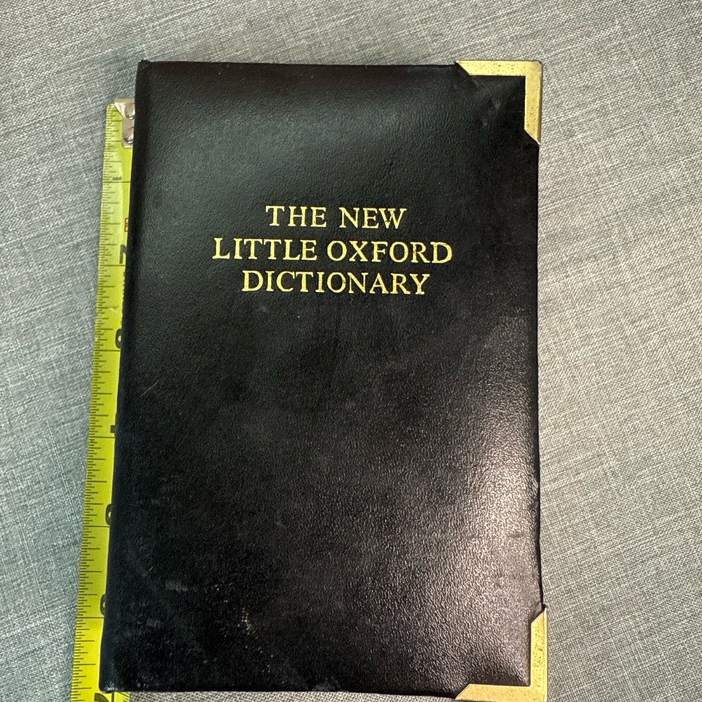 Source Unknown Black and Gold Notebook